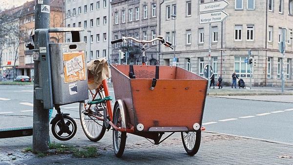 Cargo bike parked on street corner