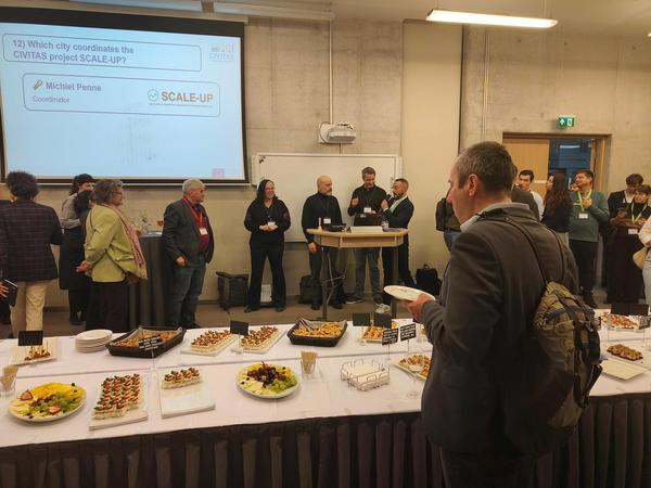 Image of the cocktail and project coordinator of Scale-Up on stage Image of the cocktail and project coordinator of Scale-Up on stage