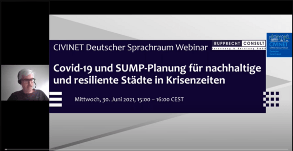 Screen still of webinar, with speakers faces