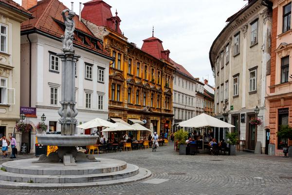 Ljubljana central square, with people sitting at outdoor tables