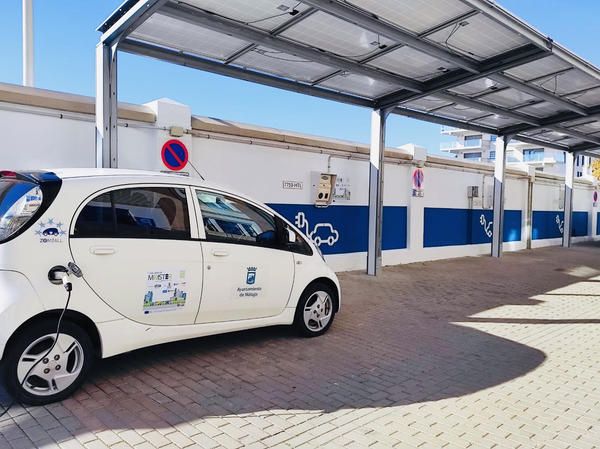 Electric car with the MEISTER logo charging in Málaga