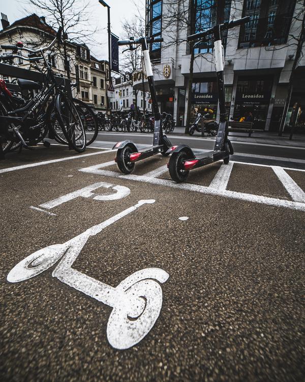 Parked scooters at a parking station