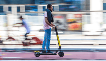 Person riding an e-scooter