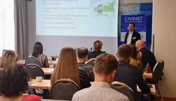 Kvetoslav Havlik presenting a powerpoint presentation about public transportation in Brno.