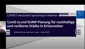 Screen still of webinar, with speakers faces