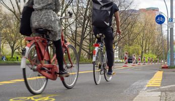 Cyclists using a temporary COVID-19 bike lane