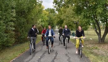 Six people cycling on a bike path in Hungary