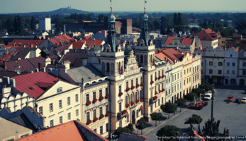 Pardubice castle with mountains and the cityscape in the background.