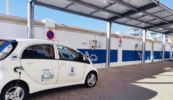 Electric car with the MEISTER logo charging in Málaga
