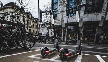 Parked scooters at a parking station